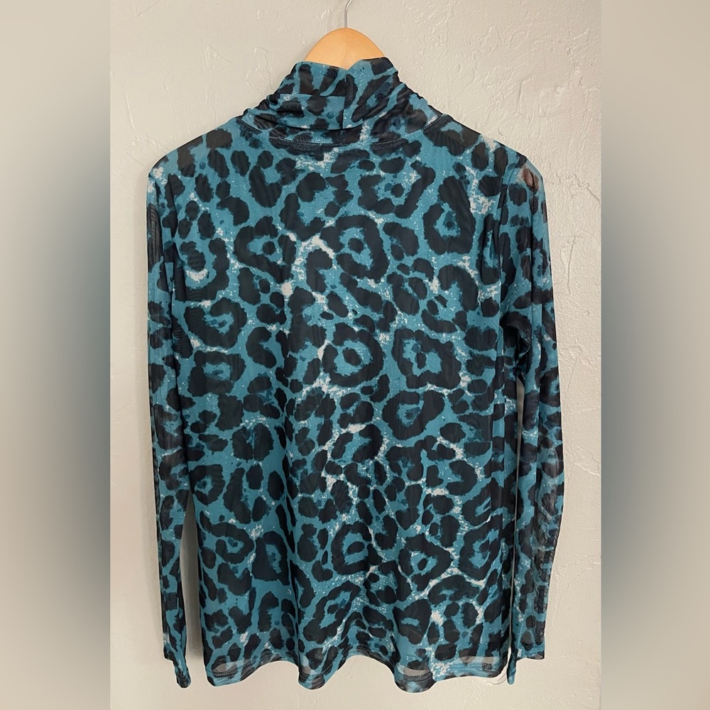 Kori mesh lined turtleneck, size M